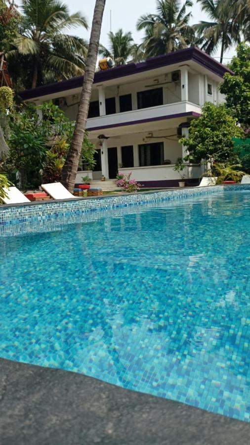 Heaven Goa Guesthouse Benaulim Esterno foto
